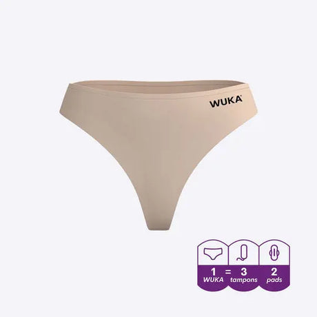 WUKA Stretch Thong i nude, for lette/middels mensdager. En behagelig, absorberende og gjenbrukbar stringtruse med diskret design, perfekt som backup eller hverdagsløsning