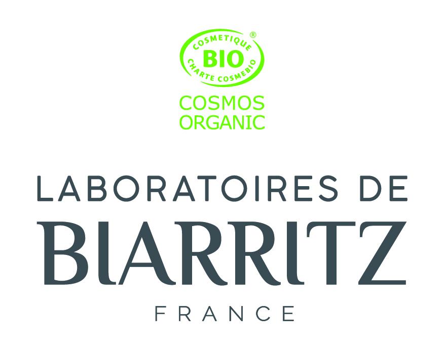 Laboratoires de Biarritz logo i mørk grå tekst med grønne økologiske sertifiseringsmerker, sett forfra