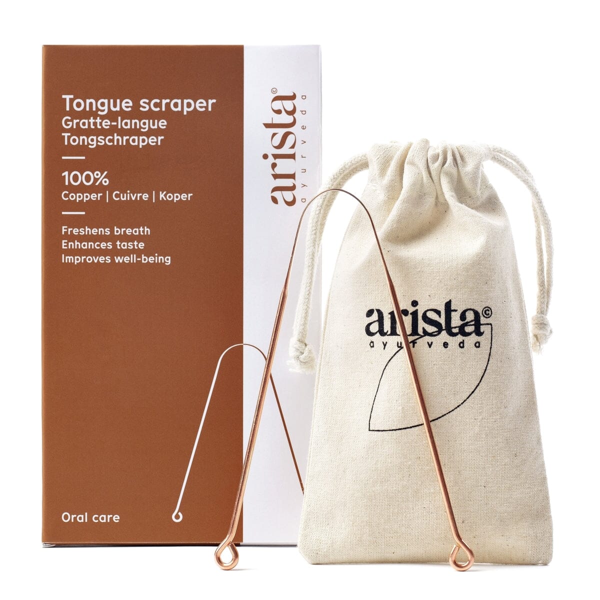 Arista Ayurveda tungeskrape i kobber i kobber i metall, med eske og tøypose ved siden av