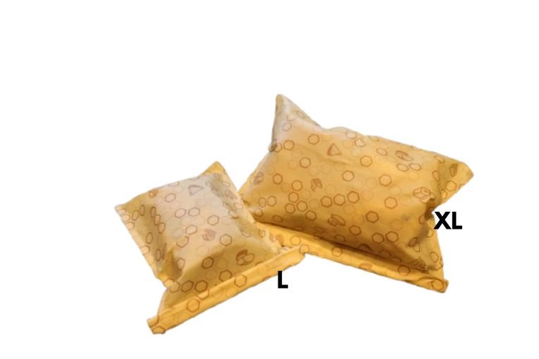 Wrappy bivoks matpose XL og L i gult bivokspapir, to varianter side ved side med størrelsesmerking