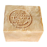 Alépia Alepposåpe 200g lys beige i såpe med preget logo sett ovenfra