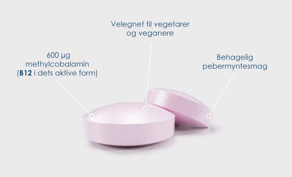 Pharma Nord BioActive B12, nærbilde av to rosa tyggetabletter med 600 µg methylcobalamin