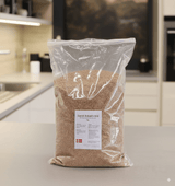 Bokashi Bokashistrø 1kg i gjennomsiktig plastpose på kjøkkenbenk