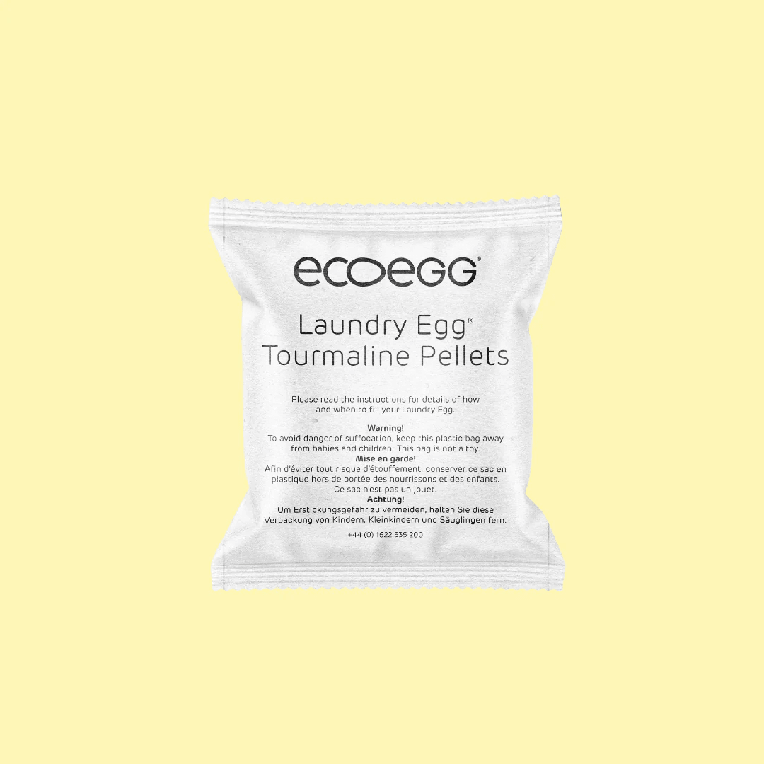 Ecoegg turmalinballer, grå i keramikk, vist i emballasje med tekst på en lys bakgrunn