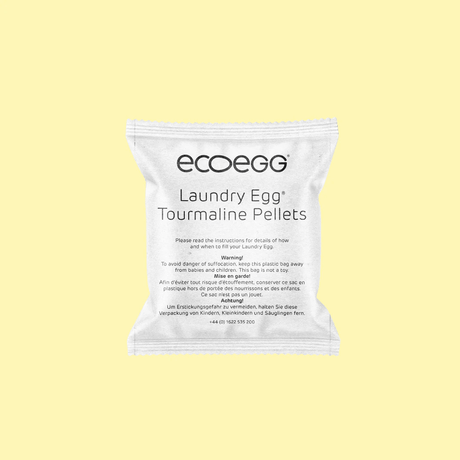 Ecoegg turmalinballer, grå i keramikk, vist i emballasje med tekst på en lys bakgrunn