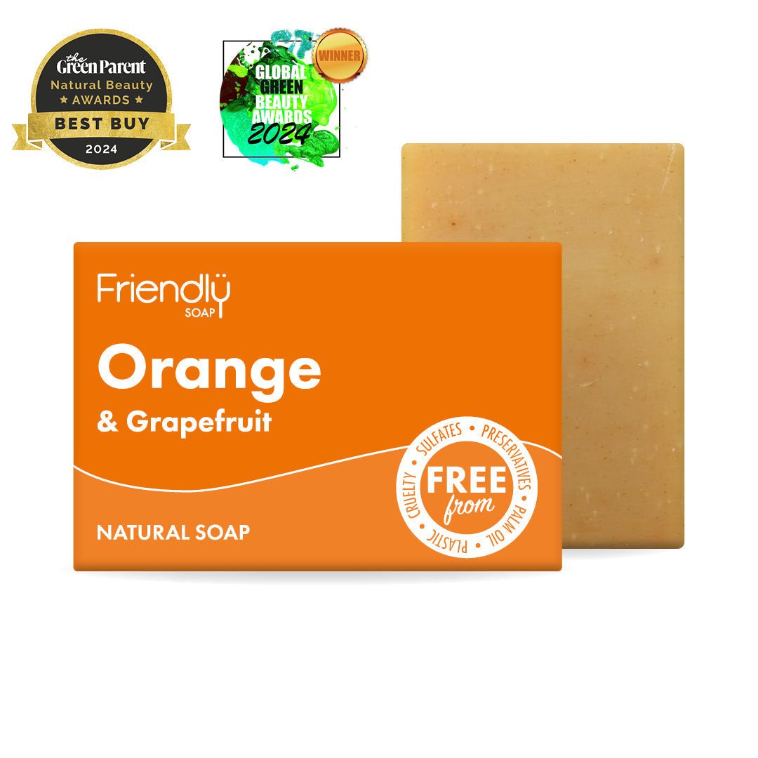 Friendly Soap såpestykke Appelsin & Grapefrukt 95g i oransje emballasje og såpestykke sett ovenfra