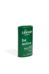 The Lekker Company deodorant stick Be Active Woodland grønn i pappemballasje med hvit tekst, sett fra siden