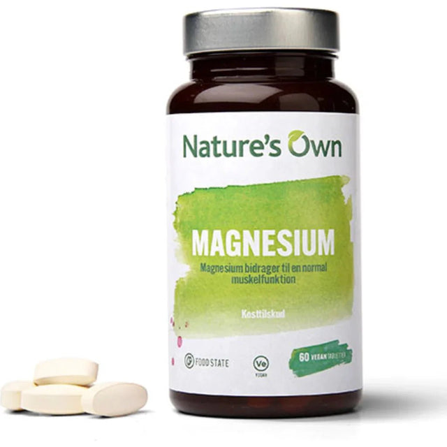Natures Own Magnesium 60 tabletter i brun glassflaske med grønn etikett, med tabletter foran Suztain.no