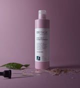 Sea Magik Balsam Pink Salt 300ml rosa i plastflaske, med dropper, blad og saltkrystaller i forgrunnen
