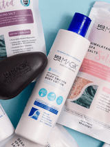 Sea Magik Silky Smooth Body Lotion 300ml hvit i plast, omgitt av andre Sea Magik produkter