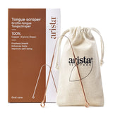 Arista Ayurveda tungeskrape i kobber i kobber i metall, med eske og tøypose ved siden av