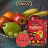 Wrappy® Pods Frisk & Sprø Startpakke med rød pod foran fruktfat med epler og druer